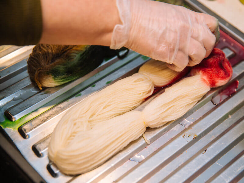 Close up of a hank of yarn during the dyeing process